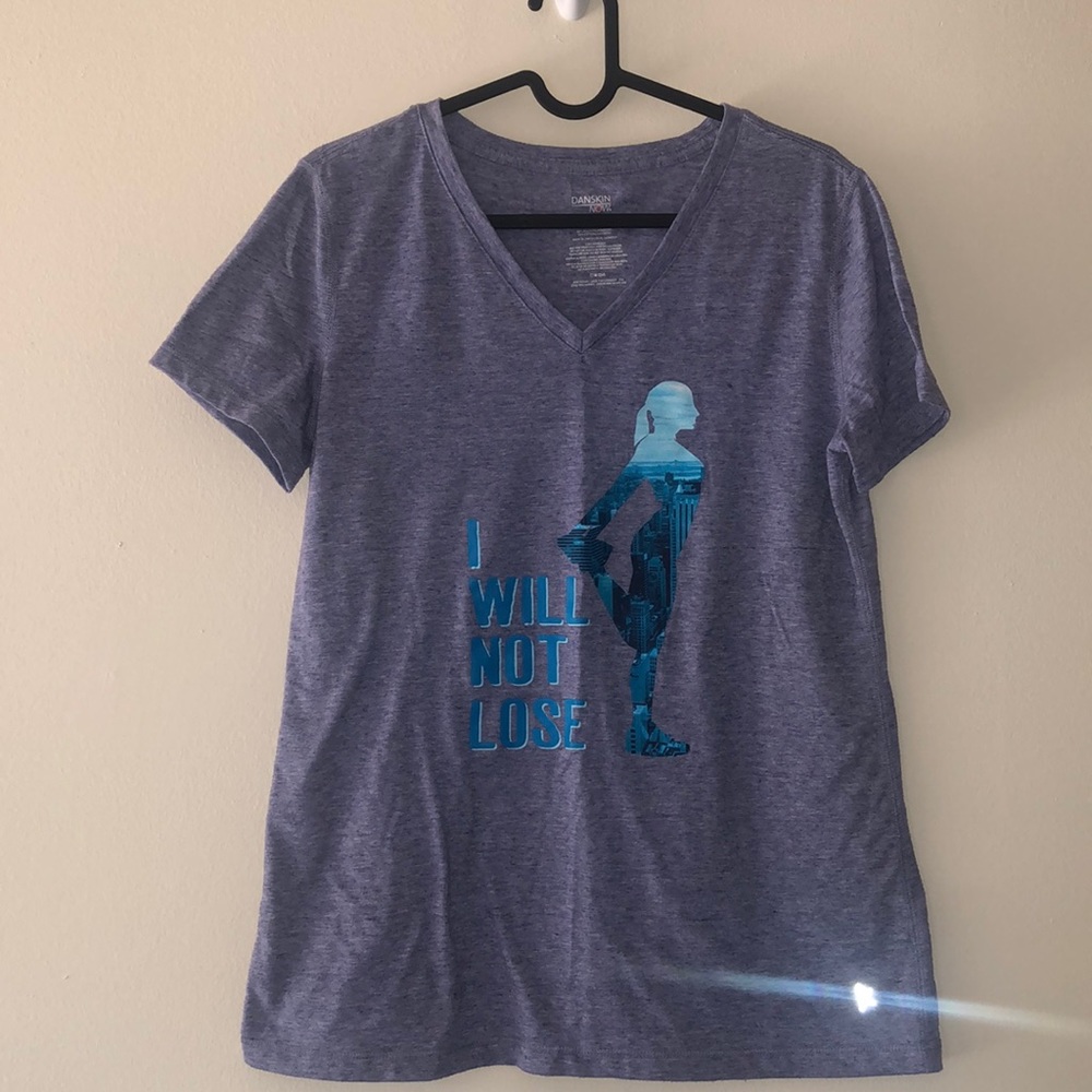 Semi fitted, Danskin Now athletic t-shirt. Size: Medium (8-10)